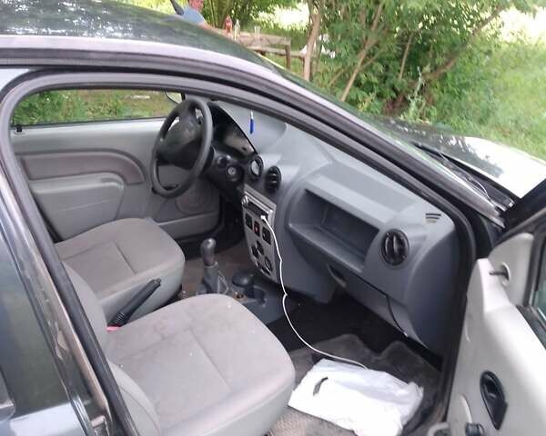 Чорний Дачія Logan, об'ємом двигуна 1.4 л та пробігом 176 тис. км за 1500 $, фото 19 на Automoto.ua