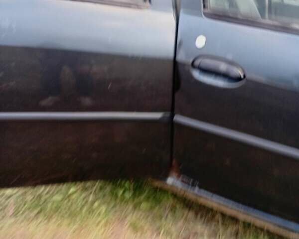 Чорний Дачія Logan, об'ємом двигуна 1.4 л та пробігом 176 тис. км за 1500 $, фото 35 на Automoto.ua