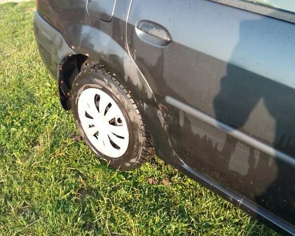 Чорний Дачія Logan, об'ємом двигуна 1.4 л та пробігом 176 тис. км за 1500 $, фото 17 на Automoto.ua