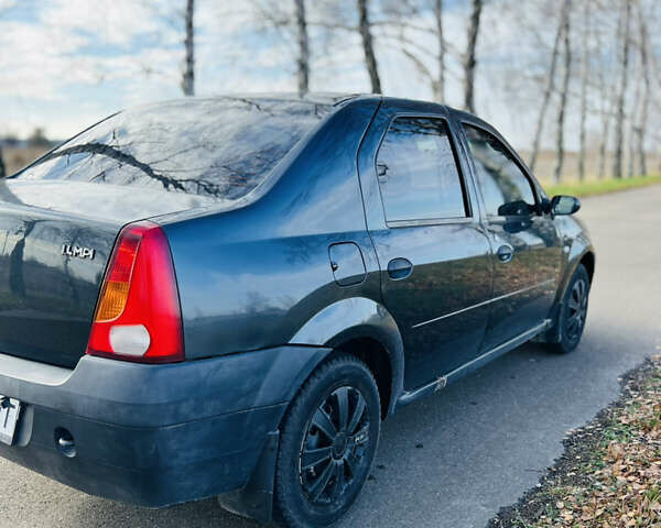 Чорний Дачія Logan, об'ємом двигуна 1.39 л та пробігом 302 тис. км за 2200 $, фото 1 на Automoto.ua