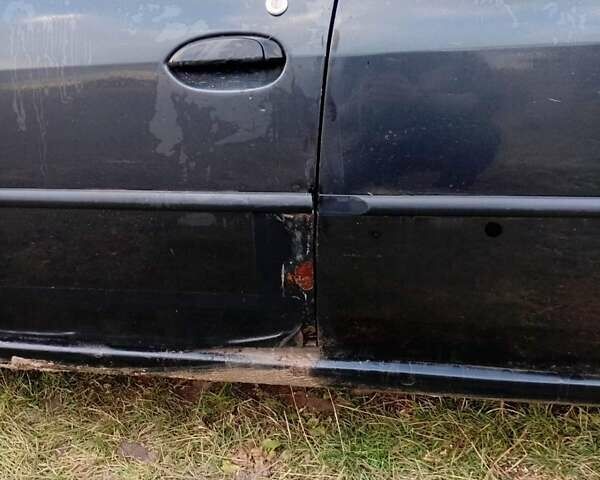 Чорний Дачія Logan, об'ємом двигуна 1.4 л та пробігом 176 тис. км за 1500 $, фото 29 на Automoto.ua