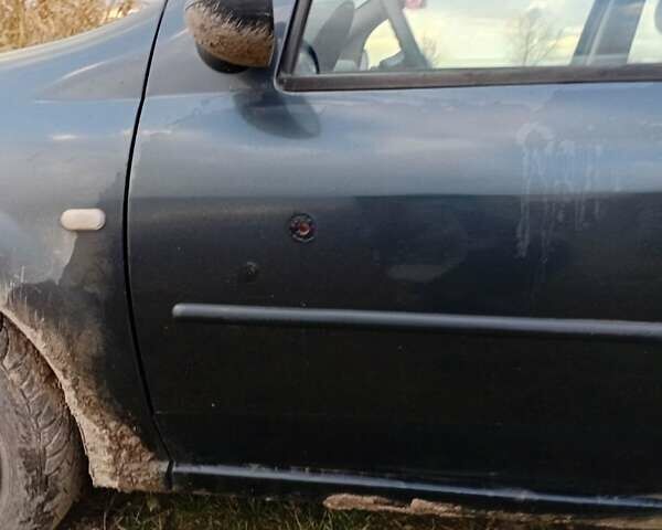 Чорний Дачія Logan, об'ємом двигуна 1.4 л та пробігом 176 тис. км за 1500 $, фото 28 на Automoto.ua