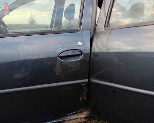 Чорний Дачія Logan, об'ємом двигуна 1.4 л та пробігом 176 тис. км за 1500 $, фото 36 на Automoto.ua