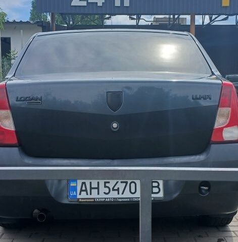 Черный Дачия Логан, объемом двигателя 1.4 л и пробегом 219 тыс. км за 3500 $, фото 3 на Automoto.ua