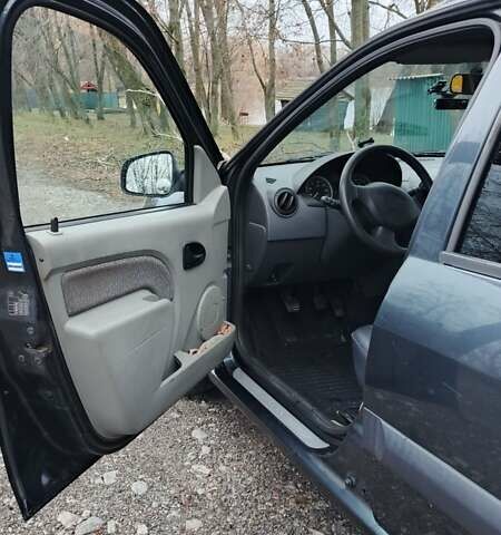 Черный Дачия Логан, объемом двигателя 1.6 л и пробегом 226 тыс. км за 4700 $, фото 33 на Automoto.ua