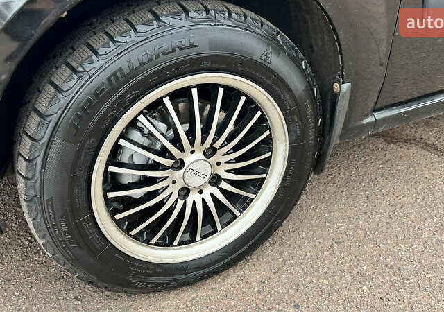 Дачия Логан 2012 в Кривом Роге на Automoto.ua Черный Дачия Логан, объемом двигателя 1.6 л и пробегом 175 тыс. км за 6999 $, фото 11 на Automoto.ua