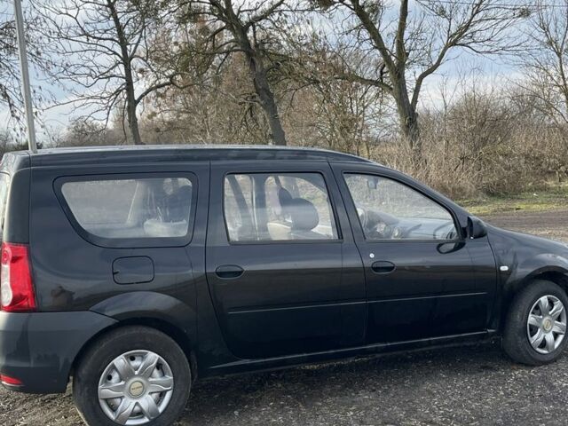 Черный Дачия Логан, объемом двигателя 1.4 л и пробегом 306 тыс. км за 3300 $, фото 4 на Automoto.ua