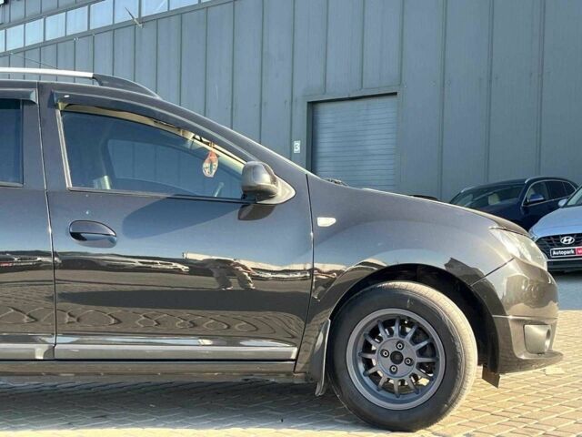 Черный Дачия Логан, объемом двигателя 0.9 л и пробегом 216 тыс. км за 5390 $, фото 11 на Automoto.ua