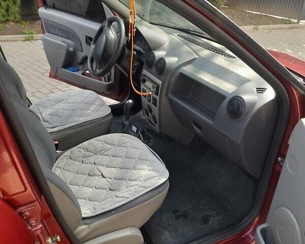 Красный Дачия Логан, объемом двигателя 1.4 л и пробегом 230 тыс. км за 2599 $, фото 8 на Automoto.ua