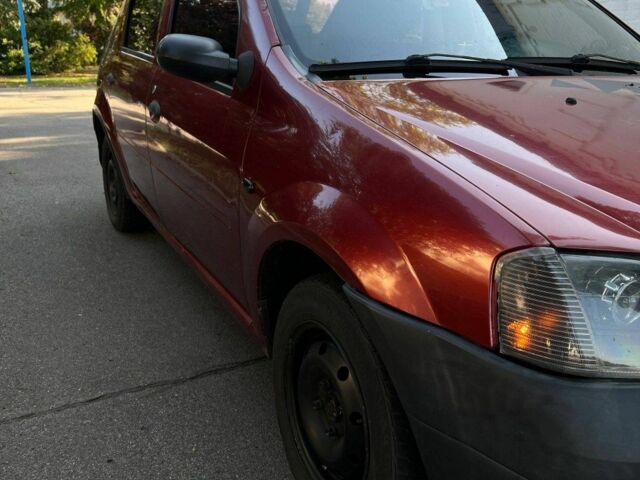 Красный Дачия Логан, объемом двигателя 1.4 л и пробегом 290 тыс. км за 2100 $, фото 2 на Automoto.ua