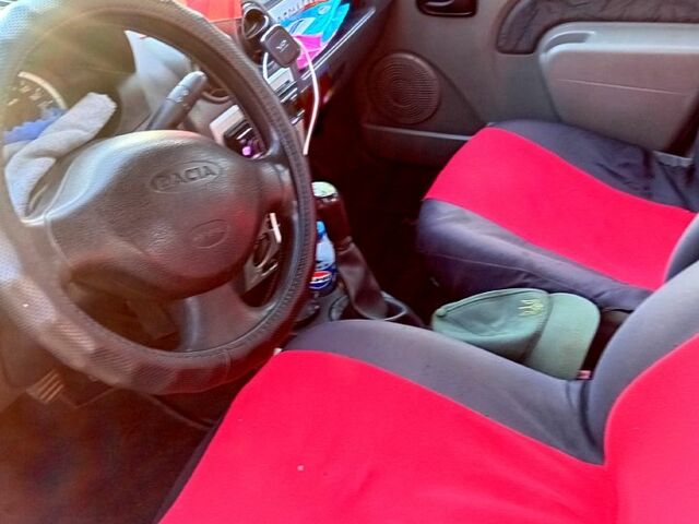 Червоний Дачія Logan, об'ємом двигуна 1.4 л та пробігом 23 тис. км за 3250 $, фото 10 на Automoto.ua