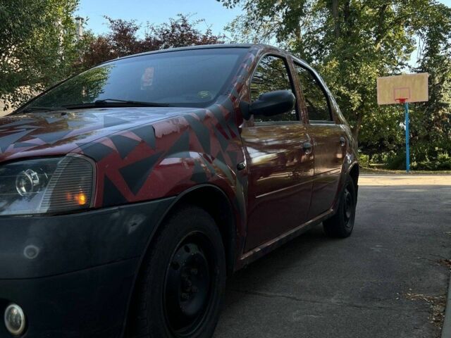 Красный Дачия Логан, объемом двигателя 1.4 л и пробегом 290 тыс. км за 2100 $, фото 1 на Automoto.ua