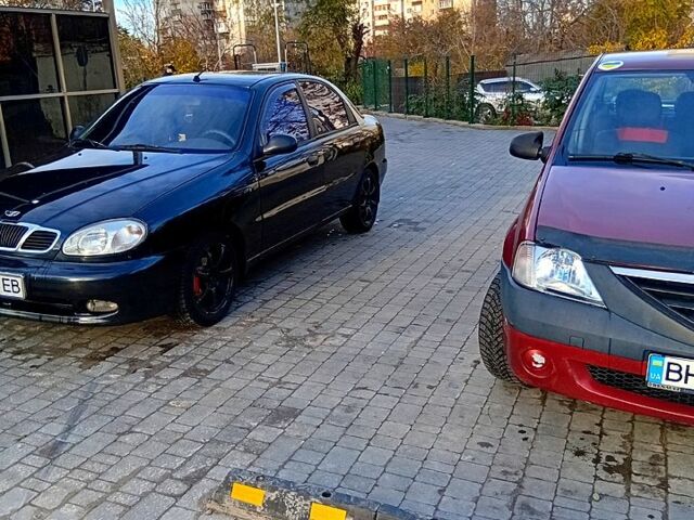 Красный Дачия Логан, объемом двигателя 1.4 л и пробегом 23 тыс. км за 3250 $, фото 10 на Automoto.ua