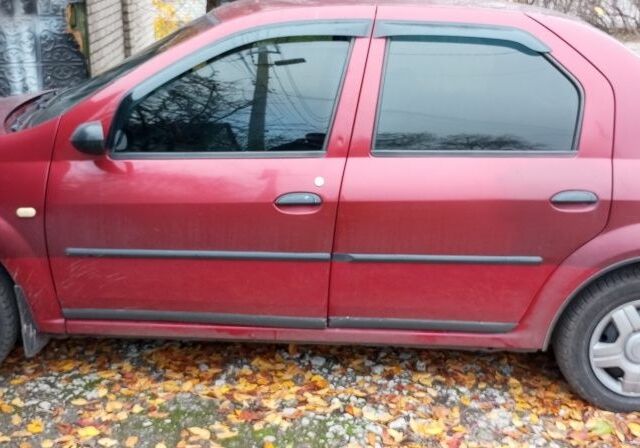 Красный Дачия Логан, объемом двигателя 1.6 л и пробегом 470 тыс. км за 2000 $, фото 3 на Automoto.ua