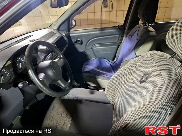 Красный Дачия Логан, объемом двигателя 14 л и пробегом 72 тыс. км за 4200 $, фото 3 на Automoto.ua