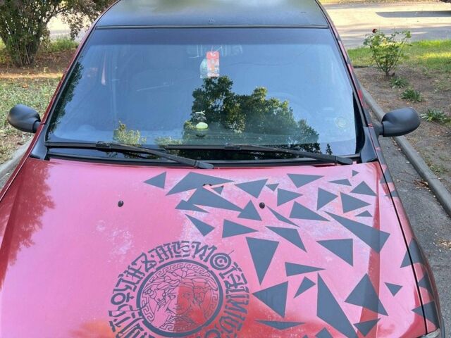 Красный Дачия Логан, объемом двигателя 1.4 л и пробегом 290 тыс. км за 2100 $, фото 5 на Automoto.ua