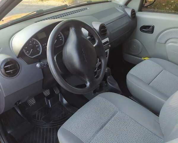 Красный Дачия Логан, объемом двигателя 1.39 л и пробегом 153 тыс. км за 3550 $, фото 4 на Automoto.ua