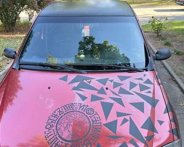 Красный Дачия Логан, объемом двигателя 1.4 л и пробегом 290 тыс. км за 2100 $, фото 4 на Automoto.ua