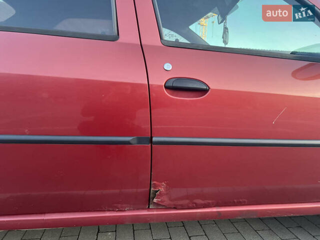 Красный Дачия Логан, объемом двигателя 1.6 л и пробегом 260 тыс. км за 3200 $, фото 16 на Automoto.ua