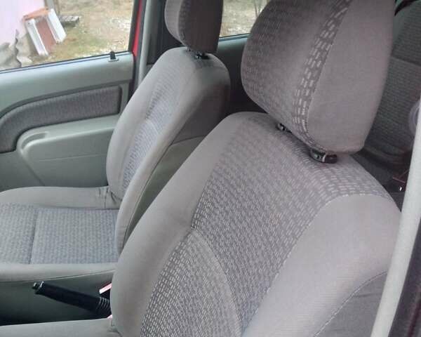 Красный Дачия Логан, объемом двигателя 1.46 л и пробегом 218 тыс. км за 3900 $, фото 8 на Automoto.ua