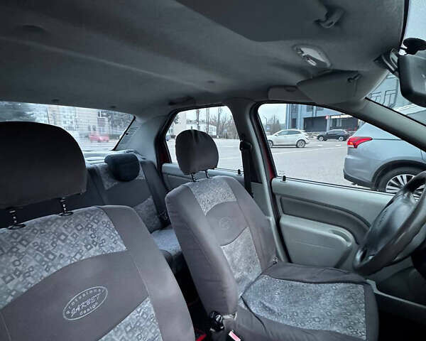 Красный Дачия Логан, объемом двигателя 1.4 л и пробегом 214 тыс. км за 3250 $, фото 19 на Automoto.ua