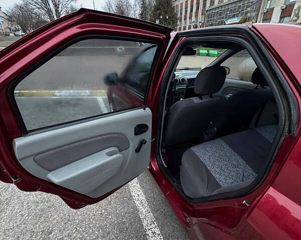 Красный Дачия Логан, объемом двигателя 1.4 л и пробегом 214 тыс. км за 3250 $, фото 7 на Automoto.ua