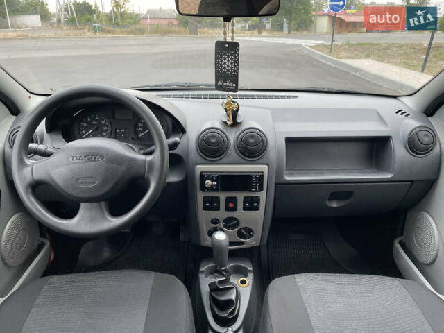 Красный Дачия Логан, объемом двигателя 1.4 л и пробегом 250 тыс. км за 3700 $, фото 5 на Automoto.ua