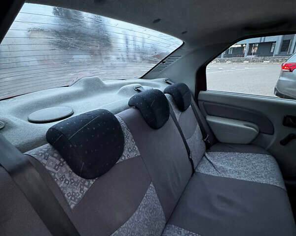 Красный Дачия Логан, объемом двигателя 1.4 л и пробегом 214 тыс. км за 3250 $, фото 11 на Automoto.ua