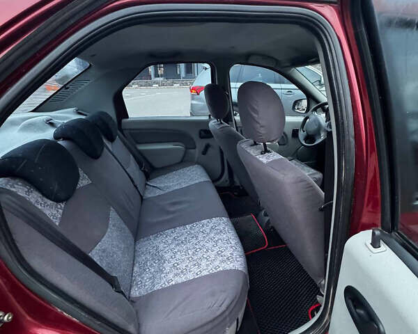 Красный Дачия Логан, объемом двигателя 1.4 л и пробегом 214 тыс. км за 3250 $, фото 10 на Automoto.ua