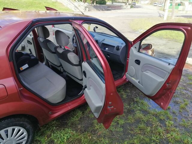 Червоний Дачія Logan, об'ємом двигуна 1.4 л та пробігом 198 тис. км за 2700 $, фото 10 на Automoto.ua