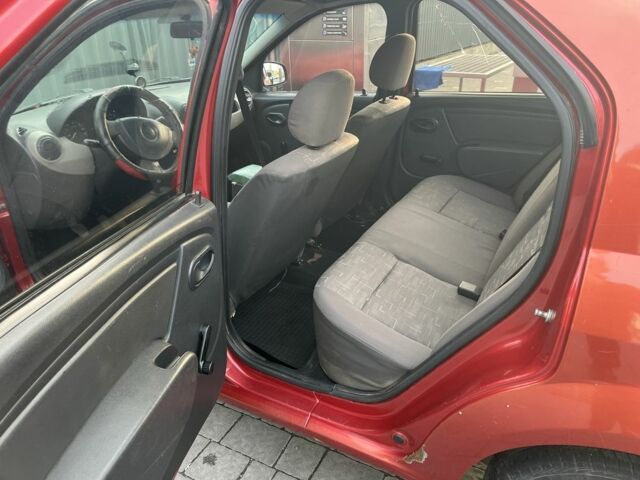 Червоний Дачія Logan, об'ємом двигуна 1.4 л та пробігом 321 тис. км за 3800 $, фото 7 на Automoto.ua