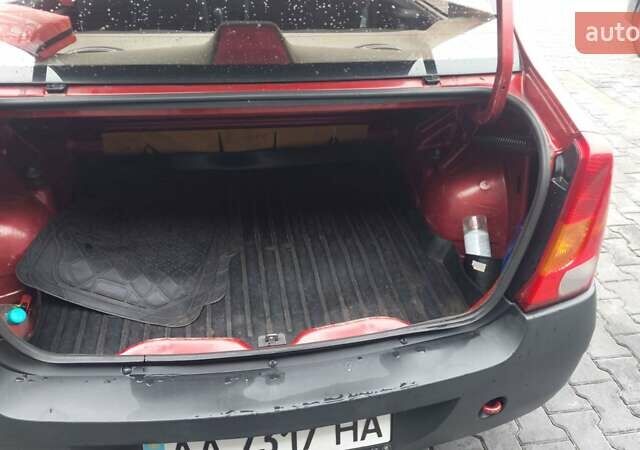 Красный Дачия Логан, объемом двигателя 1.4 л и пробегом 149 тыс. км за 2999 $, фото 1 на Automoto.ua