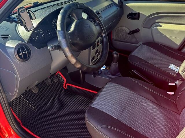 Червоний Дачія Logan, об'ємом двигуна 1.4 л та пробігом 147 тис. км за 5200 $, фото 6 на Automoto.ua