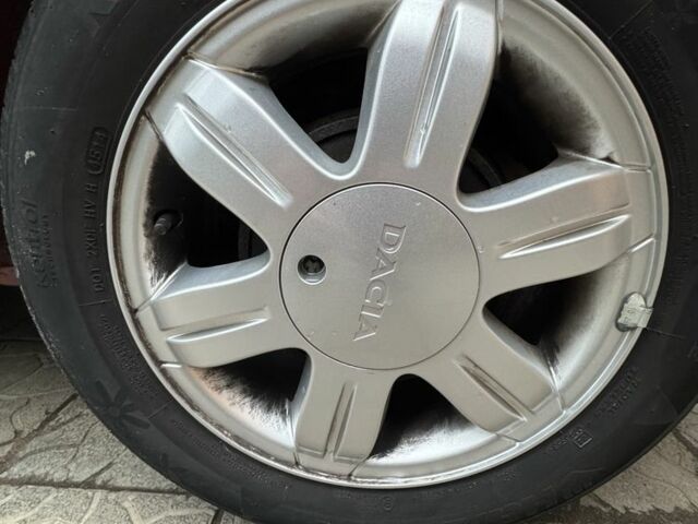 Красный Дачия Логан, объемом двигателя 1.6 л и пробегом 174 тыс. км за 5999 $, фото 10 на Automoto.ua