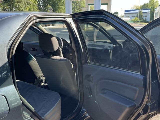 Серый Дачия Логан, объемом двигателя 1.4 л и пробегом 199 тыс. км за 2450 $, фото 11 на Automoto.ua