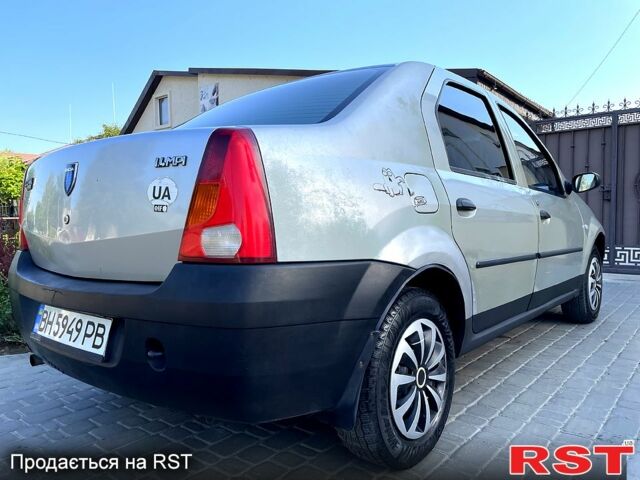 Сірий Дачія Logan, об'ємом двигуна 1.4 л та пробігом 217 тис. км за 2600 $, фото 2 на Automoto.ua