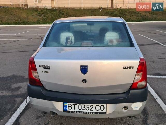 Серый Дачия Логан, объемом двигателя 1.39 л и пробегом 300 тыс. км за 1500 $, фото 4 на Automoto.ua