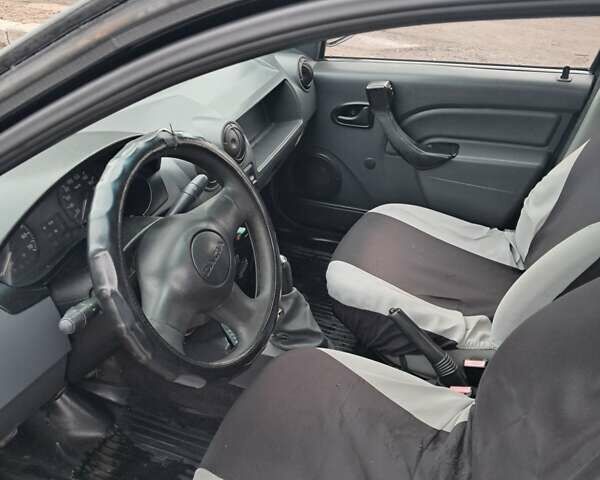 Серый Дачия Логан, объемом двигателя 1.4 л и пробегом 318 тыс. км за 2750 $, фото 5 на Automoto.ua