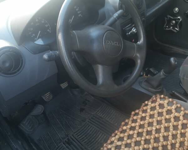 Серый Дачия Логан, объемом двигателя 1.4 л и пробегом 145 тыс. км за 3300 $, фото 3 на Automoto.ua