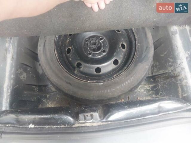 Серый Дачия Логан, объемом двигателя 1.39 л и пробегом 310 тыс. км за 2000 $, фото 8 на Automoto.ua