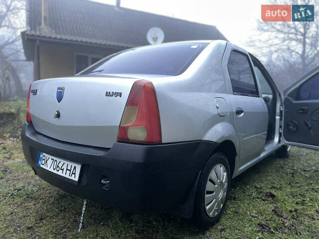 Сірий Дачія Logan, об'ємом двигуна 1.39 л та пробігом 246 тис. км за 1800 $, фото 4 на Automoto.ua
