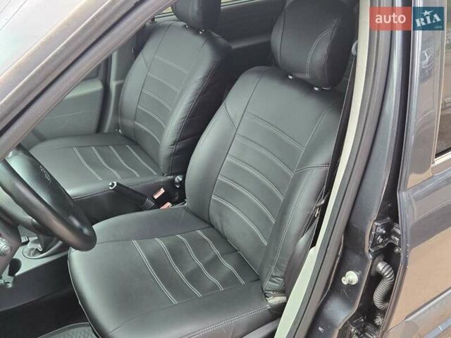 Дачія Logan 2012 у Києві на Automoto.ua Сірий Дачія Logan, об'ємом двигуна 1.6 л та пробігом 233 тис. км за 5700 $, фото 8 на Automoto.ua