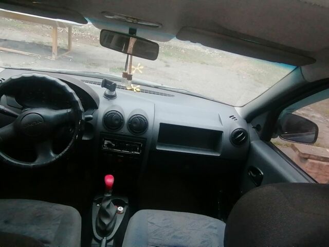 Синий Дачия Логан, объемом двигателя 1.4 л и пробегом 281 тыс. км за 1500 $, фото 5 на Automoto.ua