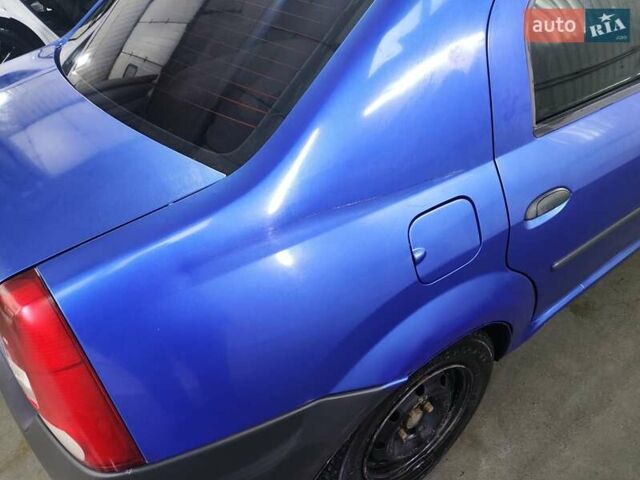 Синий Дачия Логан, объемом двигателя 1.39 л и пробегом 275 тыс. км за 2000 $, фото 4 на Automoto.ua