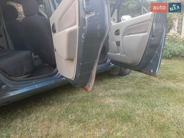 Синий Дачия Логан, объемом двигателя 1.39 л и пробегом 207 тыс. км за 3500 $, фото 11 на Automoto.ua