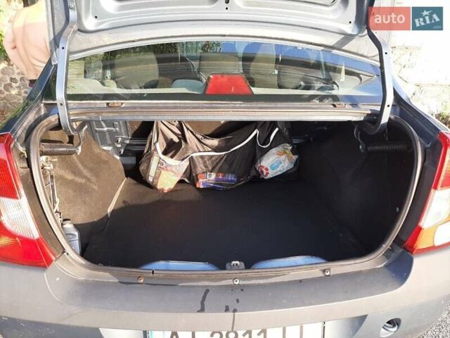Синий Дачия Логан, объемом двигателя 1.39 л и пробегом 207 тыс. км за 3500 $, фото 5 на Automoto.ua