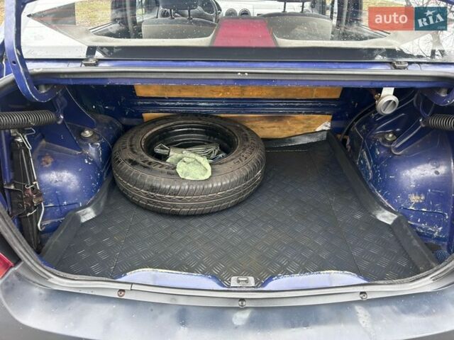 Синій Дачія Logan, об'ємом двигуна 1.4 л та пробігом 300 тис. км за 1600 $, фото 10 на Automoto.ua