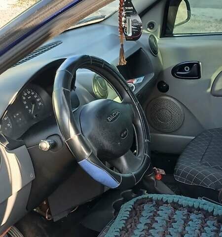 Синий Дачия Логан, объемом двигателя 1.39 л и пробегом 300 тыс. км за 1200 $, фото 2 на Automoto.ua