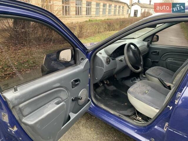 Синий Дачия Логан, объемом двигателя 1.4 л и пробегом 202 тыс. км за 3400 $, фото 4 на Automoto.ua