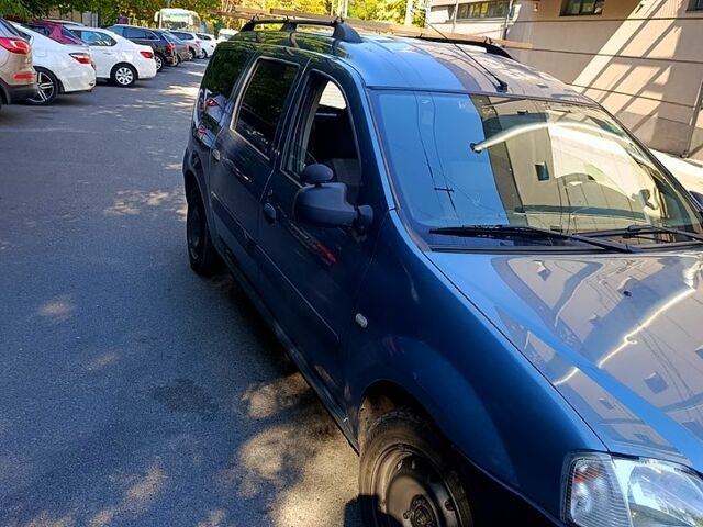 Синий Дачия Логан, объемом двигателя 1.6 л и пробегом 265 тыс. км за 5150 $, фото 4 на Automoto.ua